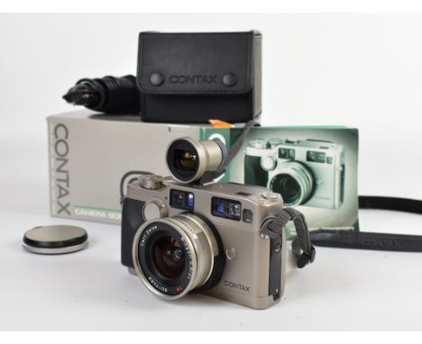Contax G2 35mm film camera, serial number 069164, with Zeiss Biogon 2.8/21 T* lens, UV filter, GF-21mm viewfinder, lens and b