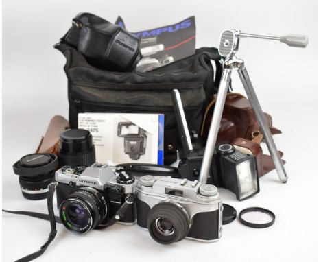Olympus OM10 35mm SLR camera outfit, serial number 1065170, with Olympus auto-S 1:1.8 f=50mm, RMC Tokina 28mm 1:2.8 and 135mm