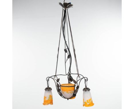 A chandelier in art deco style made of cast-iron and finished with pate-de-verre shades marked Muller Freres Luneville. Dimen
