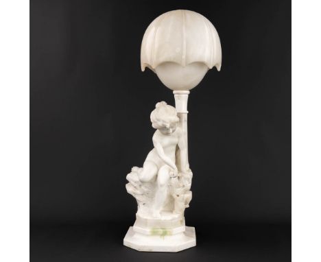 A vintage table lamp, made of sculptured alabaster. Made in Italy, 20th century.  Dimensions: (H:71 cm)