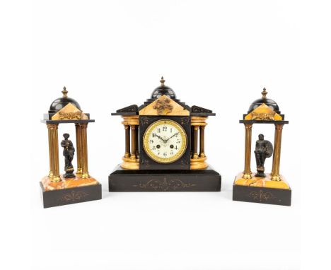 A three-piece mantle garniture clock and side pieces made of yellow and black marbl,. decorated with figurines and columns. T