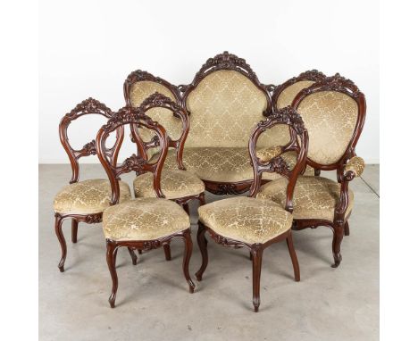 A 6-piece Louis Philippe salon suite, consisting of a large sofa, an armchair and 4 chairs.  Dimensions: (L:84 x W:173 x H:12