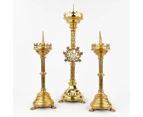 A collection of 3 church candlesticks made in gothic revival style, the first half of the 20th century.  Dimensions: (H:65 x 