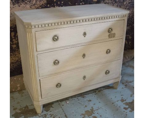 GUSTAVIAN COMMODE, 19th century, traditionally grey painted with three long drawers, canted corners and tapering supports, 10