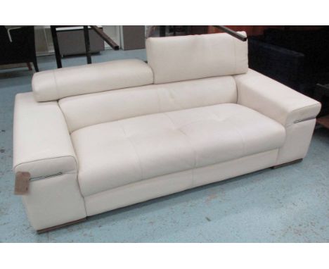 NATUZZI SOFA, two seater, in cream leather, on chromed metal supports, 210cm L. 