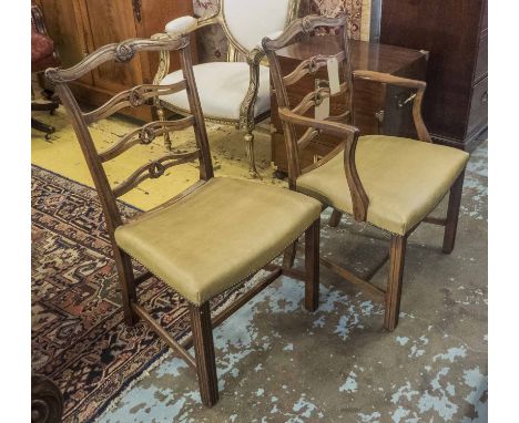 DINING CHAIRS, a set of six, including two carvers, Georgian style mahogany with carved ladder backs and stuff-over seats, ca