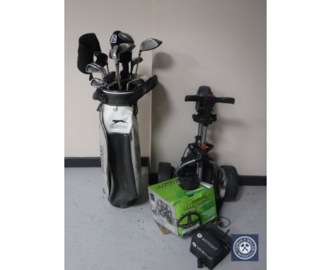 A Slazenger golf bag, set of King Cobra irons, assorted drivers and a Motor caddy electric golf cart 