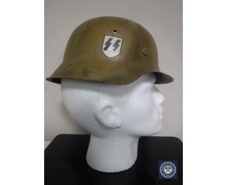 A German M42 type helmet with later SS decal