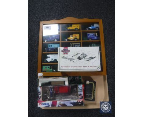 A tray of display case of sixteen die cast advertising vehicles, a Corgi Italian Job mini and three further boxed vehicles  