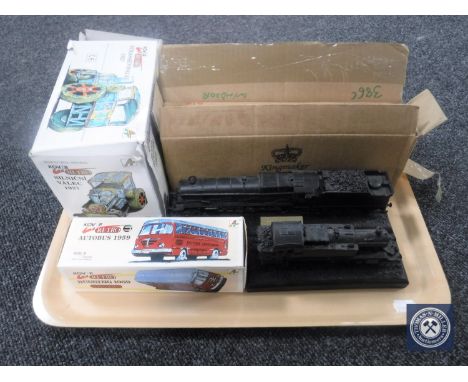 A tray containing four Kingmaker scale model trains together with a boxed Kovap retro bus and a boxed Kovap retro traction en