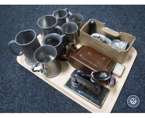 A tray of pewter tankards, vintage mincer, vintage hole punch, leather cased camera and two pill boxes 