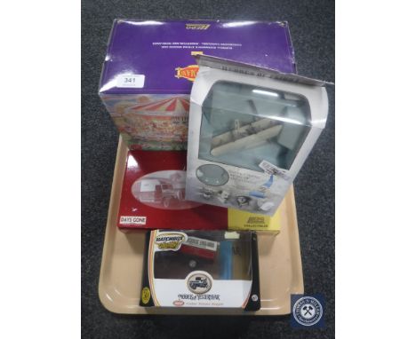A tray of Days Gone By Showmans steam wagon and cardboard carousel, two other boxed die cast vehicles and a Corgi Heroes of F