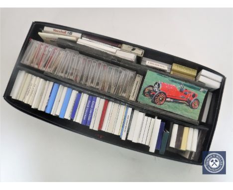 A box containing vintage matchbooks