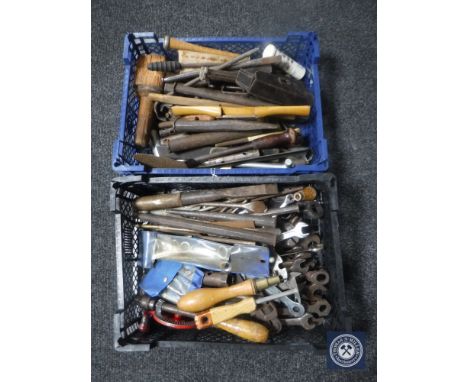 Two baskets containing vintage hand tools