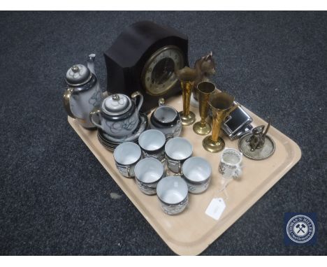 A tray containing brass spill vases, vintage Smiths Enfield Bakelite cased clock, opera glasses, Japanese tea service etc