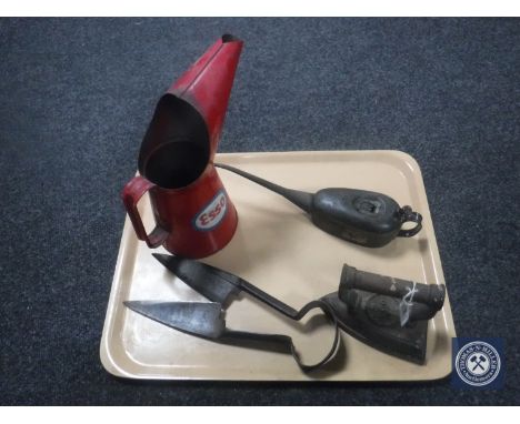 A tray of vintage Esso oil can, one other, flat iron, shears 