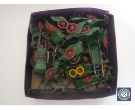 A box containing a quantity of vintage lead hand-painted horse and carts, figures etc