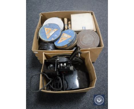 Two boxes of Pathescope projector and reels 