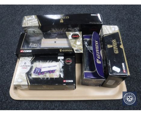 A tray containing five boxed Corgi Guinness die cast wagons