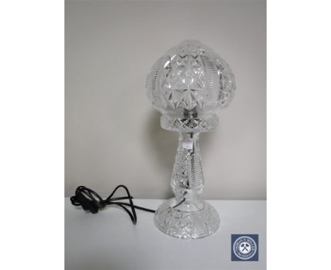 A cut glass table lamp with shade 