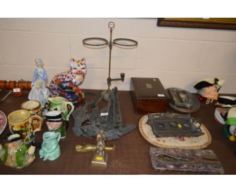 A double oil lamp stand; together with a quantity of wall oil lamp holders; brass figurine etc. 