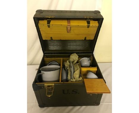 WWII Era US Travelling Trunk of enamelled Dinner/Tea Service and Cutlery, with Oval Plaque to the top of Manufacturer.