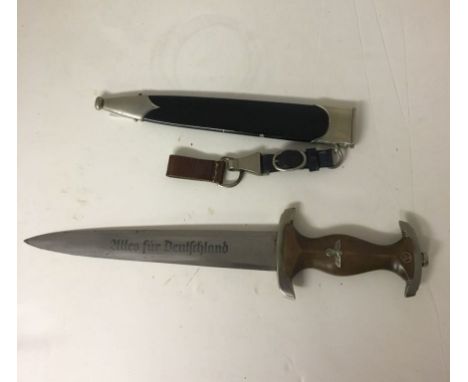 WWII German NSKK Dress Dagger and Sheath with Hanger, Cross guard marked Ns, blade by Eickhorn. Hanger marked RZM M5/25 for C