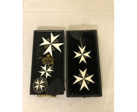 Complete set of Order of St. John, including Knight Star and neck badge plus other star and neck badge. Includes breast badge