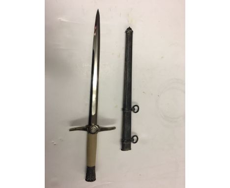 German Dagger and sheath, Chromed blade with Swastika and Eagle finial, unmarked with a swirl to the hilt.