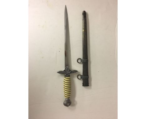 WWII German Luftwaffe 2nd pattern Dress Dagger and sheath, Blade Named "Louis Trim" to the blade and gilded.  Blade marked Ei