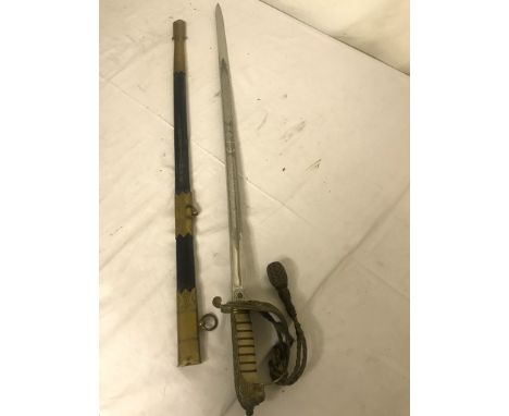 WWI GVR English Navy Sword Portepee and Sheath.  The blade Marked "Samuel Brothers Ltd Outfitters 65 & 67 Ludgate Hill London