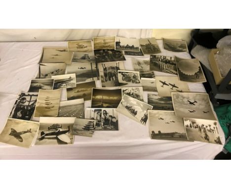 A quantity of WWII photographs, rare of spitfires, light bombers, Bolton Paul Defiants, Arab horseman etc.