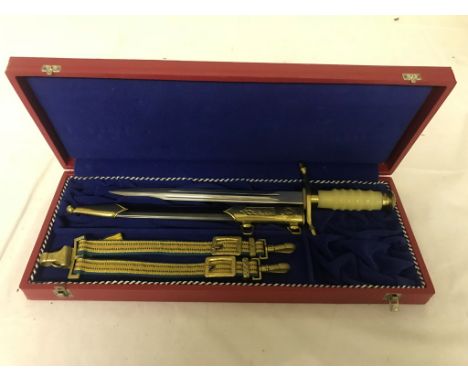 Post war German Sheathed Dagger and hanger in box.
