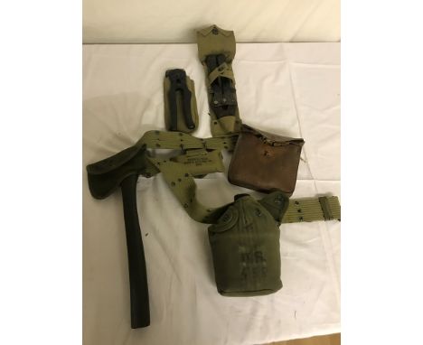 US Webbing belt with water bottle, Axe and dressing kit, along with Hand saw and two pairs of cutters.