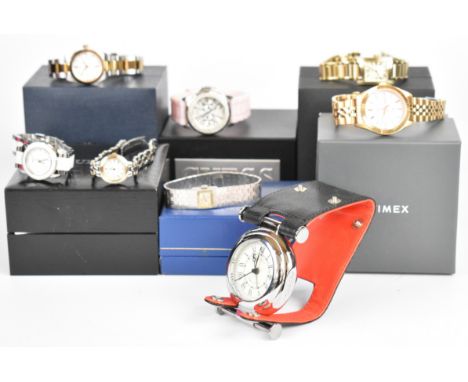 Eight various wristwatches including Guess, Rotary, Tissot and Timex, most in original boxes together with a travel clock.&nb