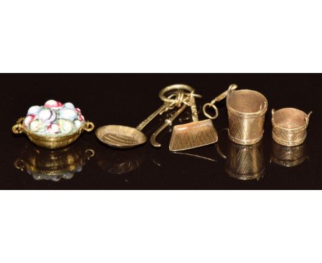 Three c1880 gold charms including basket of fruit with carved carnelian intaglio seal to underside,&nbsp; bucket, gold prospe