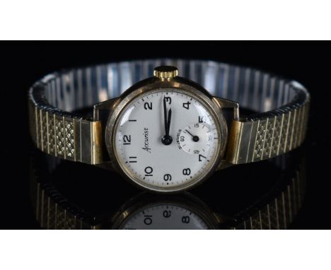 Two 9ct gold ladies wristwatches Churchill with gold hands and hour markers, silver dial and quartz movement, on 9ct gold bra
