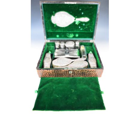 Edward VII hallmarked silver travelling set comprising hand mirror, four brushes, comb and seven silver lidded glass pots, ea