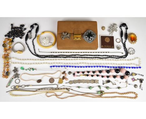 A collection of jewellery including Miracle Creation brooch, silver brooch mount, Art Deco earrings, French jet beads, ram's 