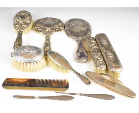 Hallmarked silver mounted dressing table items comprising two hand mirrors, four brushes, comb, nail buffer and two silver ha