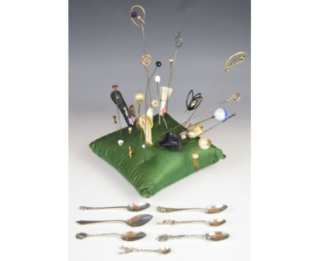 Two Charles Horner silver hat pins, 9ct gold hat pin, silver gilt horseshoe stick pin, further hat pins, a stick pin in the f