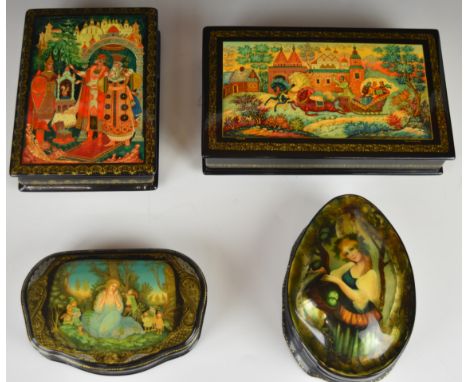Four large Russian lacquer boxes comprising girl picking apples by Belpakoba, Snow White and the Seven Dwarfs by E Krasnob, T