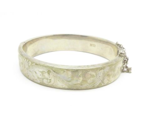 A hallmarked silver bangle, 33.7g 