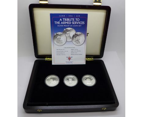 A Tribute to the Armed Services, a silver proof £5 coin set, boxed, 53 of 495