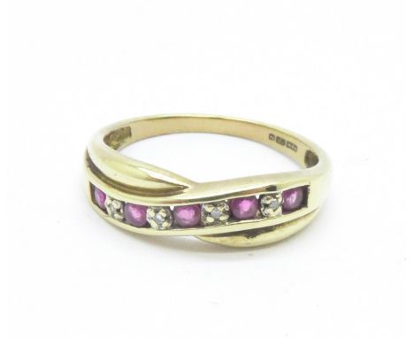 A 9ct gold, ruby and diamond ring, 1.9g, N 