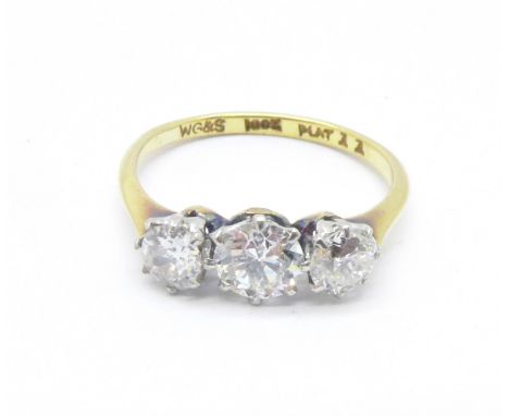 An 18ct gold, platinum set three stone diamond trilogy ring, approximately 1 carat diamond weight,  2.5g, M 