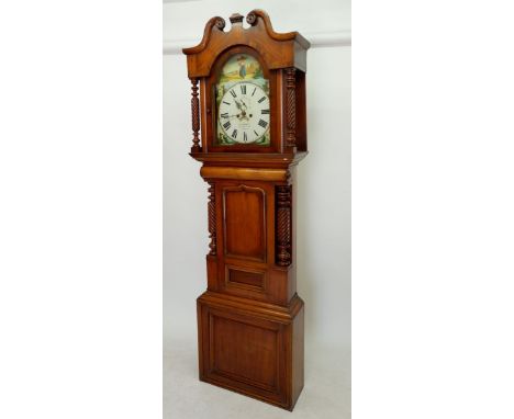 A Victorian mahogany longcase clock with swan neck pediment over carved wrythen spiral supports flanking hood and case, the e