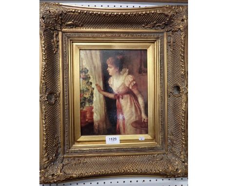 A decorative reproduction print of a woman by a window in gilt frame, 24 x 19cm