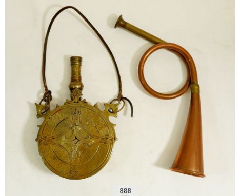 A copper hunting horn and an Eastern brass powder flask 