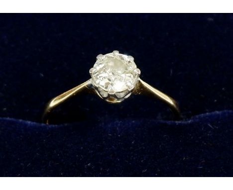 An 18 carat gold solitaire diamond ring, size M/N 